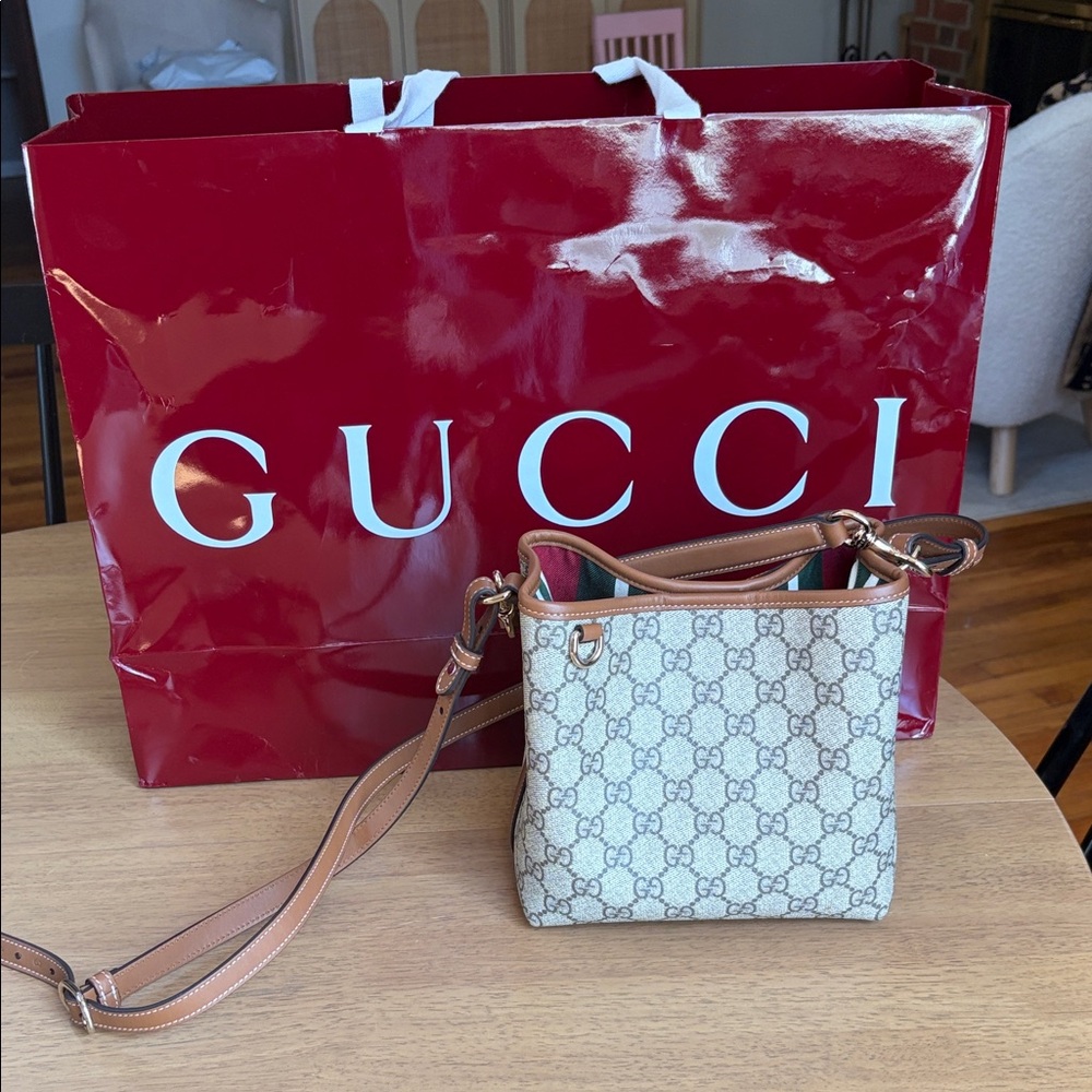 Gucci GG Emblem small bucket bag